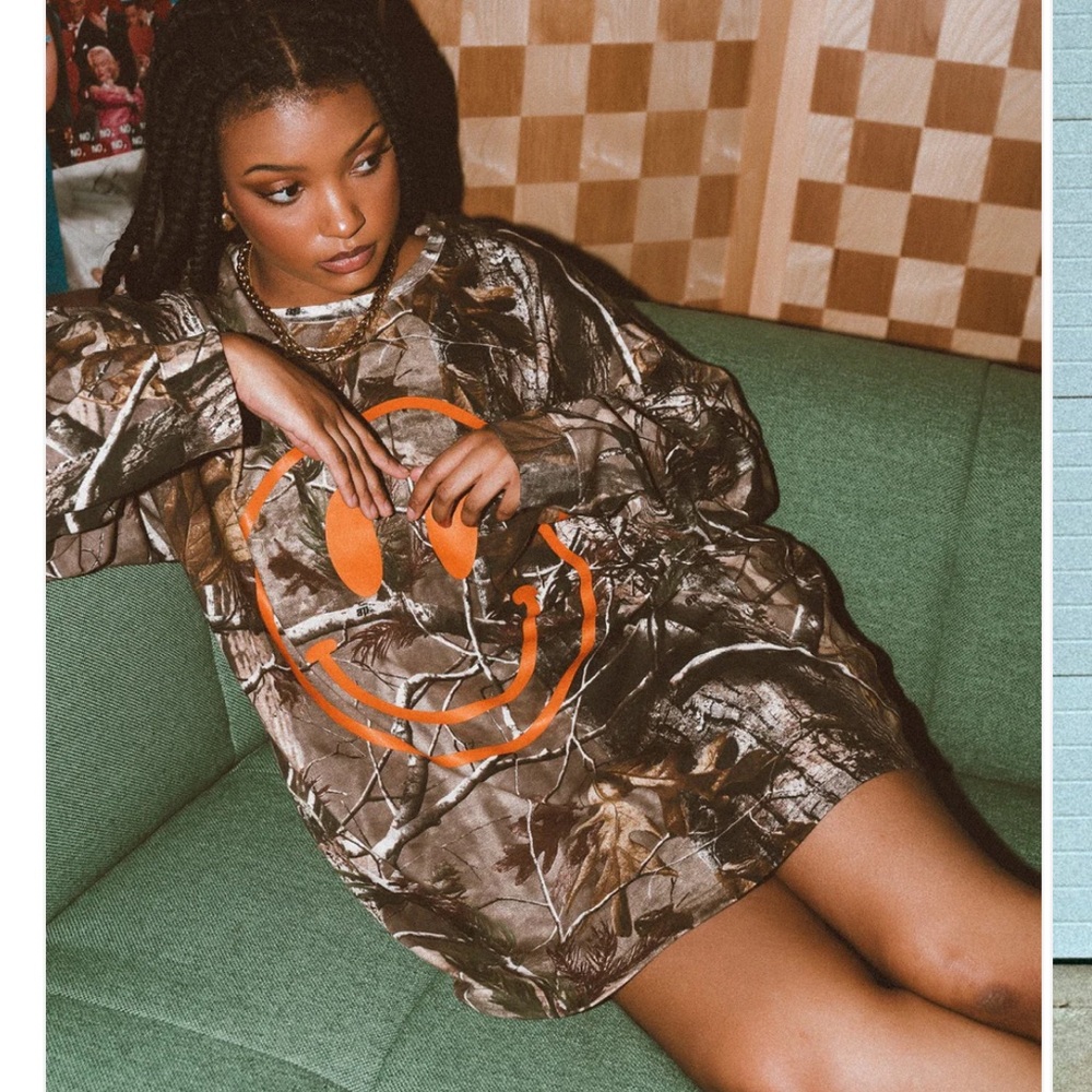 Dressed in LALA Camo Long Sleeve with Orange Smiley